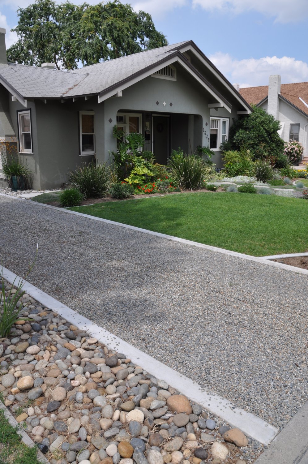 Gravel Driveway Edged with River Rocks